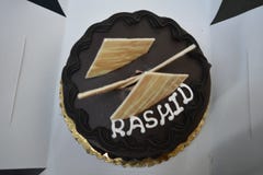 Gâteau d'anniversaire avec le nom Rashid photographie stock Gâteau d'anniversaire avec le nom Rashid photographie stock