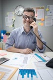 Głupka urzędnik na telefonie Fotografia Stock Głupka urzędnik na telefonie Fotografia Stock