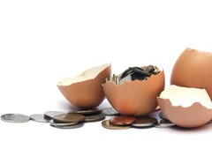 Half egg shell and coin, isolated on white background stock photography Half egg shell and coin, isolated on white background stock photography