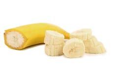 Half Of Banana And Slices. Stock Image