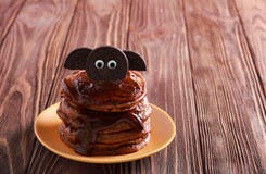 Halloween chocolate pancakes served with glaze Royalty Free Stock Photos Halloween chocolate pancakes served with glaze Royalty Free Stock Photos