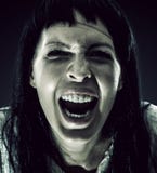 Halloween scary brunette woman with long hair royalty free stock images Halloween scary brunette woman with long hair royalty free stock images