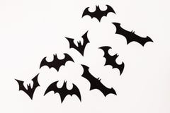 Halloween paper black bats on white background. Flat lay, top view.