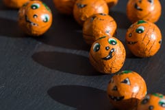 Halloween treats with cute faces and shadows. stock images Halloween treats with cute faces and shadows. stock images