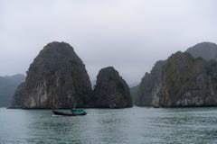 Halong Bay in mystical clouds. Mystical atmoshpere in the world famous halong bay. royalty free stock photography Halong Bay in mystical clouds. Mystical atmoshpere in the world famous halong bay. royalty free stock photography
