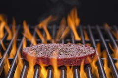 Hamburger Cooking On A Flaming Grill Royalty Free Stock Images Hamburger Cooking On A Flaming Grill Royalty Free Stock Images