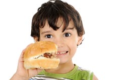 Hamburger felice della tenuta del bambino Fotografia Stock Libera da Diritti Hamburger felice della tenuta del bambino Fotografia Stock Libera da Diritti