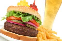 Hamburger meal with french fries and cold beer royalty free stock image Hamburger meal with french fries and cold beer royalty free stock image