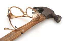 Hammer And Safety Glasses Stock Images