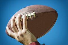 Hand with american football Stock Photography Hand with american football Stock Photography