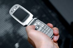 Hand And Cell Phone Stock Image