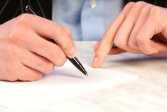 Hand And Pen Royalty Free Stock Image