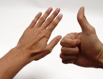 Hand And Thumb Stock Photos
