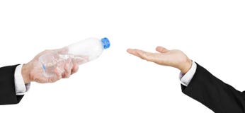 Hand of businessman holding, giving, receiving bottle of water, isolated on white background Stock Images Hand of businessman holding, giving, receiving bottle of water, isolated on white background Stock Images