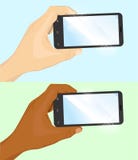 Hand of caucasian and african american man holding black horizontal smartphone. On white background Stock Photos Hand of caucasian and african american man holding black horizontal smartphone. On white background Stock Photos