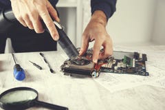 Hand computer processor with a vacuum cleaner stock photos Hand computer processor with a vacuum cleaner stock photos