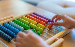 Hand Counting Colorful Beads Abacus stock photography Hand Counting Colorful Beads Abacus stock photography