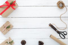 Hand crafted Christmas present gifts box and tools on white wooden background. royalty free stock photos Hand crafted Christmas present gifts box and tools on white wooden background. royalty free stock photos