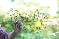 Hand drawing sketches of happy family on the glass Stock Photo Hand drawing sketches of happy family on the glass Stock Photo