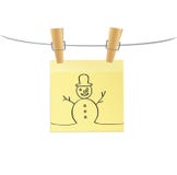 Hand-drawn christmas snowman on yellow sticker hanging on clothespins. Vector on white background. Hand-drawn christmas tree and santa claus and snowman on three vector illustration Hand-drawn christmas snowman on yellow sticker hanging on clothespins. Vector on white background. Hand-drawn christmas tree and santa claus and snowman on three vector illustration