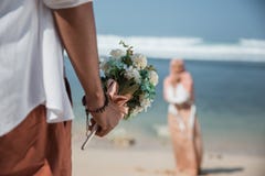 Hand with flower bouquet royalty free stock photo Hand with flower bouquet royalty free stock photo