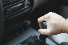Hand holding change car gear to driving on the road concept in t royalty free stock images Hand holding change car gear to driving on the road concept in t royalty free stock images