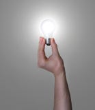 Hand Holding Glowing Light Bulb Royalty Free Stock Photo Hand Holding Glowing Light Bulb Royalty Free Stock Photo