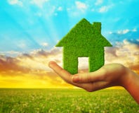 Hand holding green Eco house icon royalty free stock photography Hand holding green Eco house icon royalty free stock photography