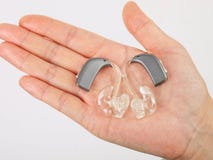 Hand Holding Hearing Aid Stock Image Hand Holding Hearing Aid Stock Image