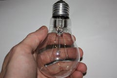 Hand holding a lamp royalty free stock photo Hand holding a lamp royalty free stock photo