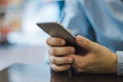Hand holding smartphone Royalty Free Stock Photos Hand holding smartphone Royalty Free Stock Photos