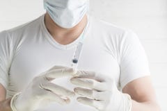 Hand holding syringe isolated on white royalty free stock photography Hand holding syringe isolated on white royalty free stock photography