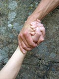 Hand In A Hand Stock Photo
