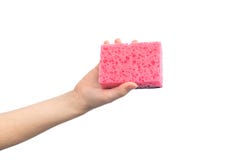 Hand with kitchen cleaning sponge isolated on a white background photo