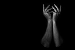 Hand Of Depressed And Hopeless Man Alone In The Dark Royalty Free Stock Image