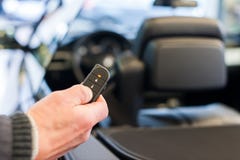 Hand open car with wireless key stock photo Hand open car with wireless key stock photo