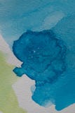 Hand painted watercolor background. Yellow and blue watercolor brush strokes on textured paper. Royalty Free Stock Photography Hand painted watercolor background. Yellow and blue watercolor brush strokes on textured paper. Royalty Free Stock Photography