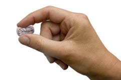 Hand Pinching A Chinese Yuan Stock Photography Hand Pinching A Chinese Yuan Stock Photography