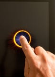 Hand Pressing A Button With Index Finger Stock Photo