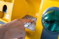 Hand pressing the code from the ATM focuses on the numbers and the finger area stock photos Hand pressing the code from the ATM focuses on the numbers and the finger area stock photos