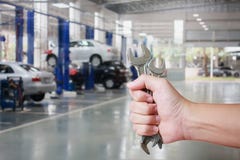 Hand of professional Auto mechanic with wrench Stock Image Hand of professional Auto mechanic with wrench Stock Image