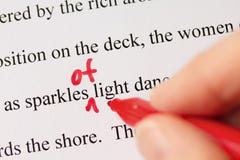 Hand with Red Pen Proofreading Text Closeup stock image Hand with Red Pen Proofreading Text Closeup stock image