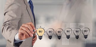Hand som drar idérik affärsstrategi arkivbild Hand som drar idérik affärsstrategi arkivbild