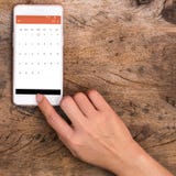 Hand touching smart phone royalty free stock images Hand touching smart phone royalty free stock images