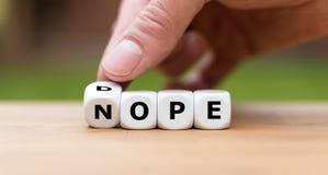 Hand is turning a dice royalty free stock images Hand is turning a dice royalty free stock images