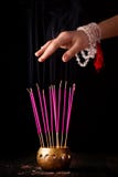 Hand With Rosary Over Smoke, Reiki Concept Stock Photography