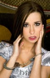 Handcuffed young woman looks distressed Royalty Free Stock Photos Handcuffed young woman looks distressed Royalty Free Stock Photos