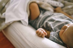 Handle a newborn baby with a manicure. Newborn health royalty free stock photo Handle a newborn baby with a manicure. Newborn health royalty free stock photo