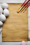 Handmade paper sheet, eggs and brushes Royalty Free Stock Photo Handmade paper sheet, eggs and brushes Royalty Free Stock Photo