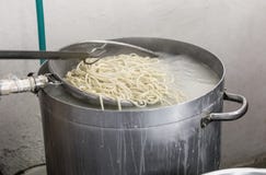 Handmade Pasta Pici cooked in a large Pot Royalty Free Stock Images Handmade Pasta Pici cooked in a large Pot Royalty Free Stock Images